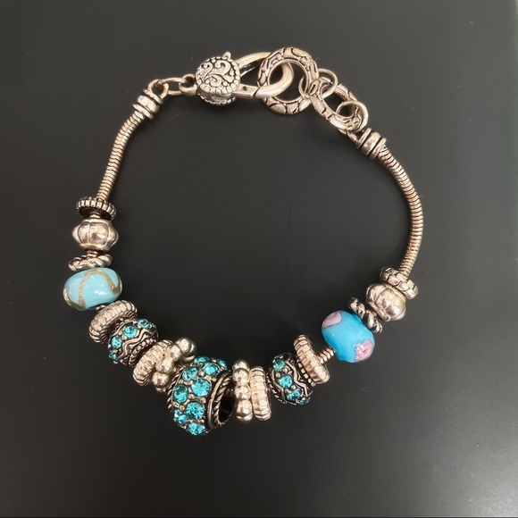 Charm bracelets in silver and gold - Picture 2 of 6